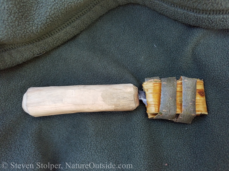 knife in bark sheath